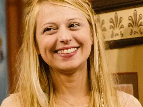 Portrait of a blonde woman smiling